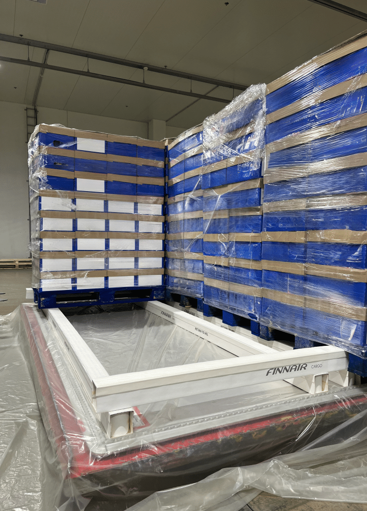 AirCargoRunner on PMC pallet being loaded with palletized air cargo